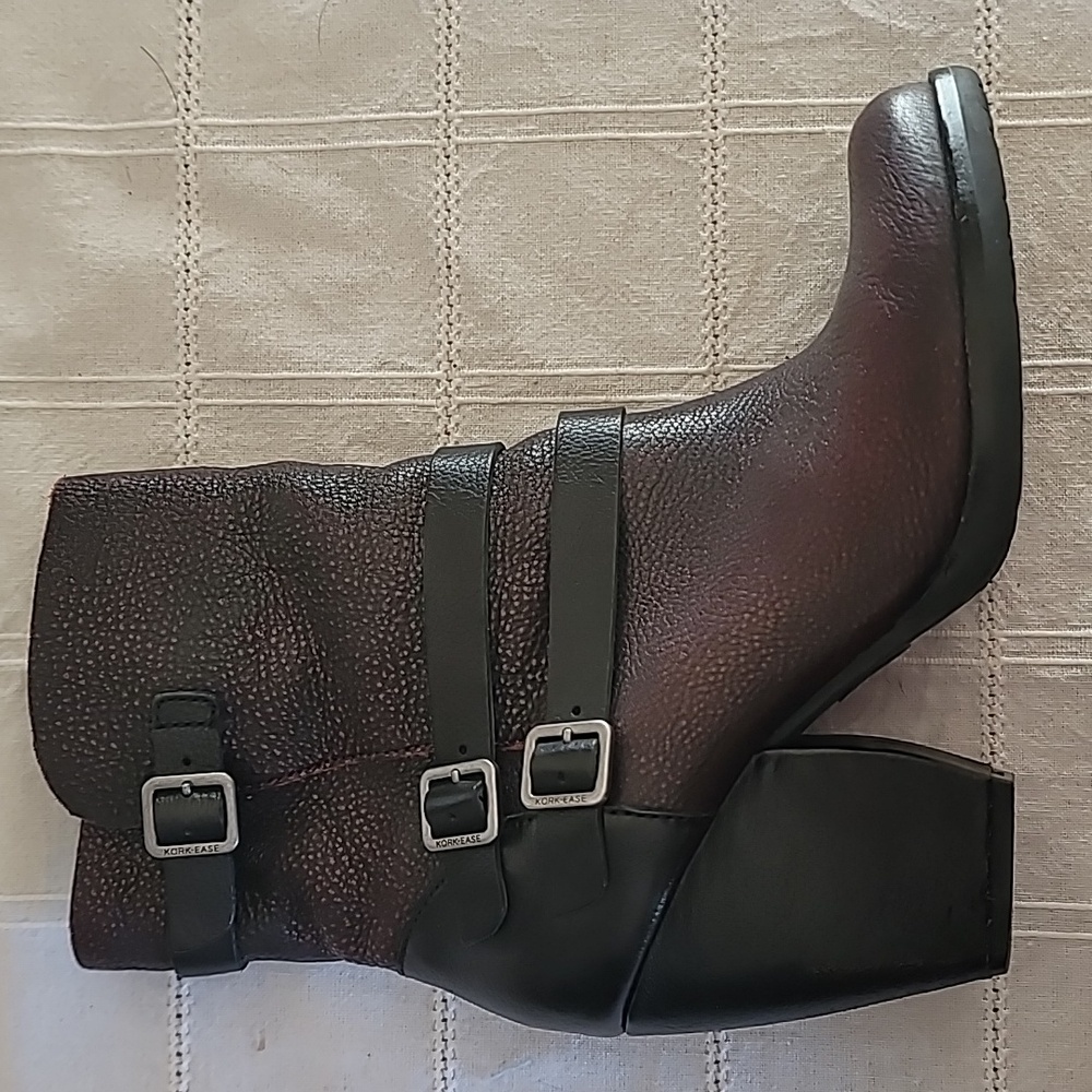 Kork-Ease Strappy zippered leather boots.